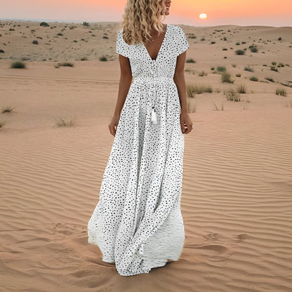 Sophie – Zwiewna sukienka maxi w groszki z dekoltem w serek