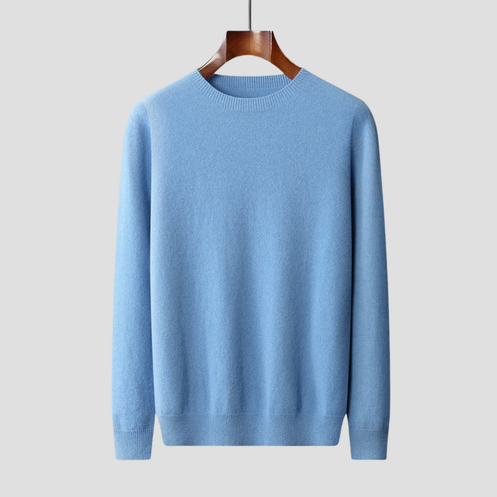 Light blue sweater on a wooden hanger against a light gray background
