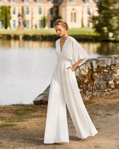 Ava – Elegant Wide-Leg Deep-V Evening Jumpsuit for Women