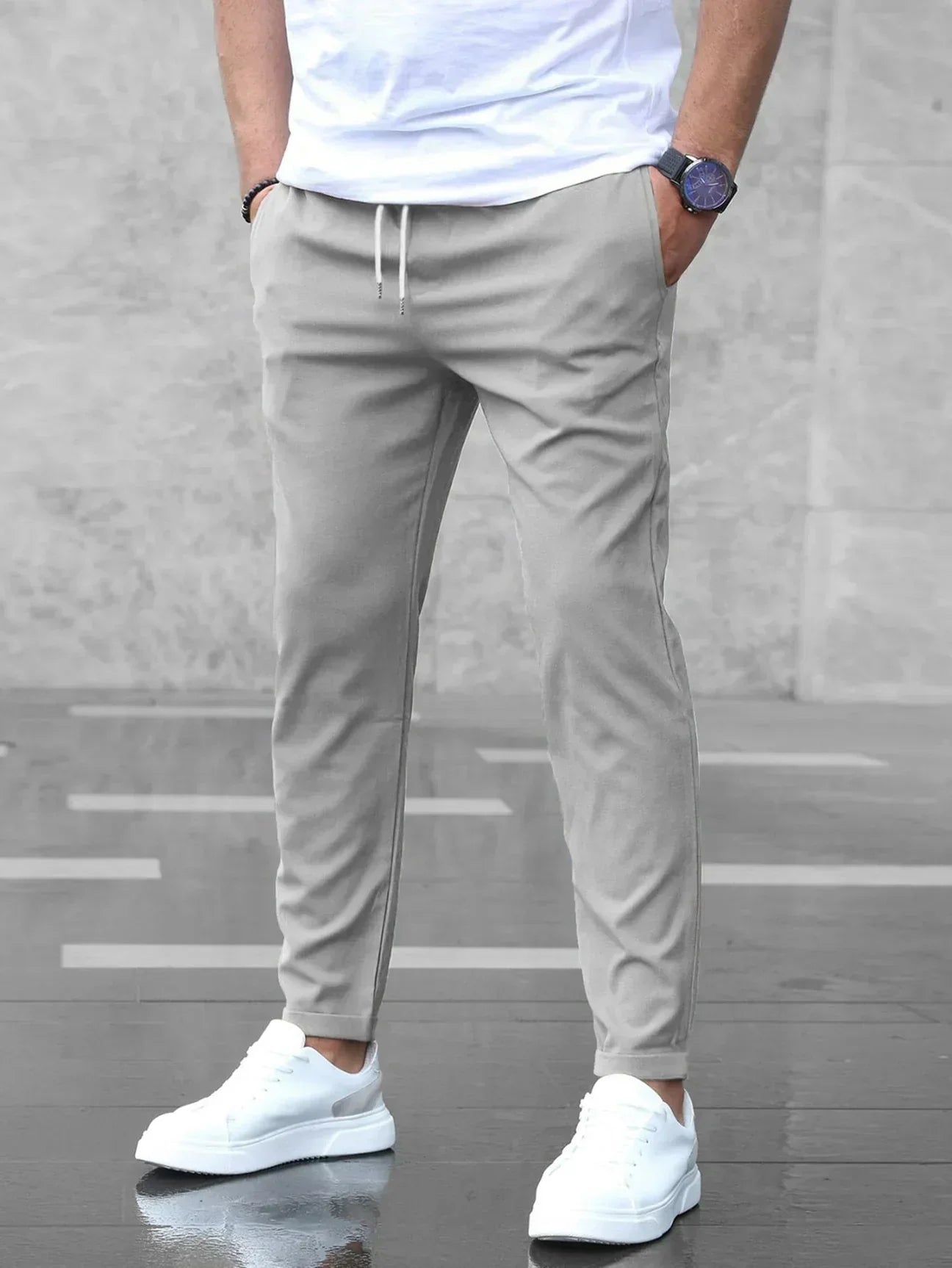 Leon - Spodnie męskie slim fit z elastycznym pasem i wiązaniem