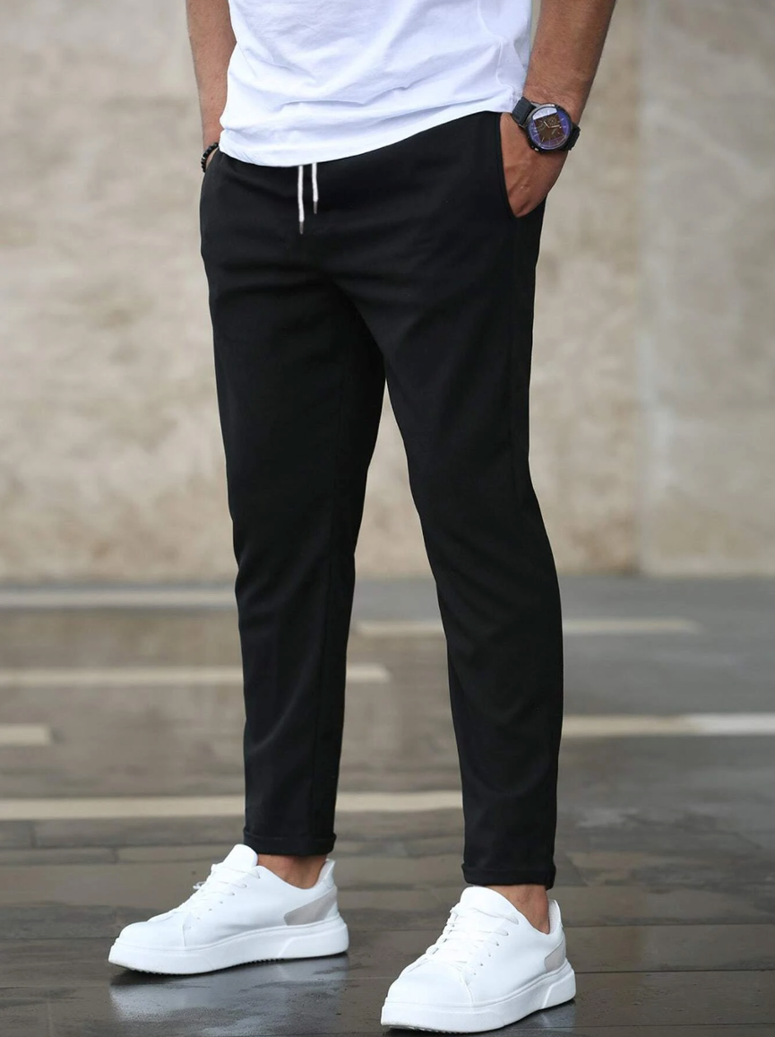 Leon - Spodnie męskie slim fit z elastycznym pasem i wiązaniem