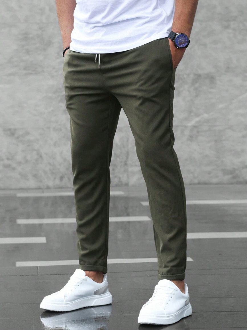 Leon - Spodnie męskie slim fit z elastycznym pasem i wiązaniem