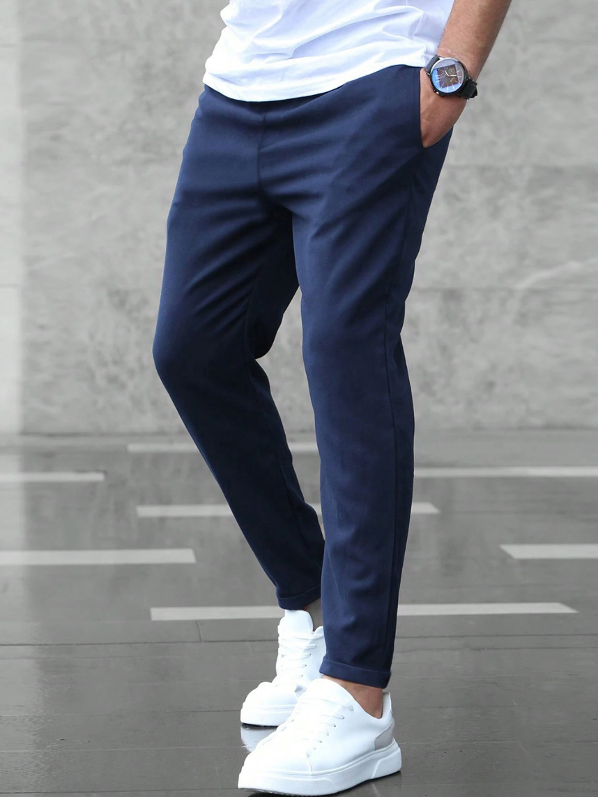 Leon - Spodnie męskie slim fit z elastycznym pasem i wiązaniem