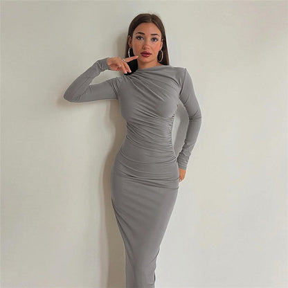 Patrycja – Dopasowana sukienka midi z długim rękawem