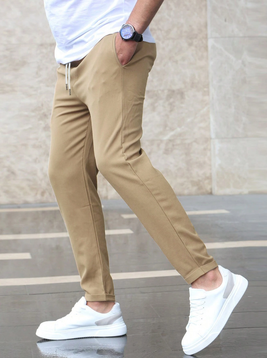 Leon - Spodnie męskie slim fit z elastycznym pasem i wiązaniem