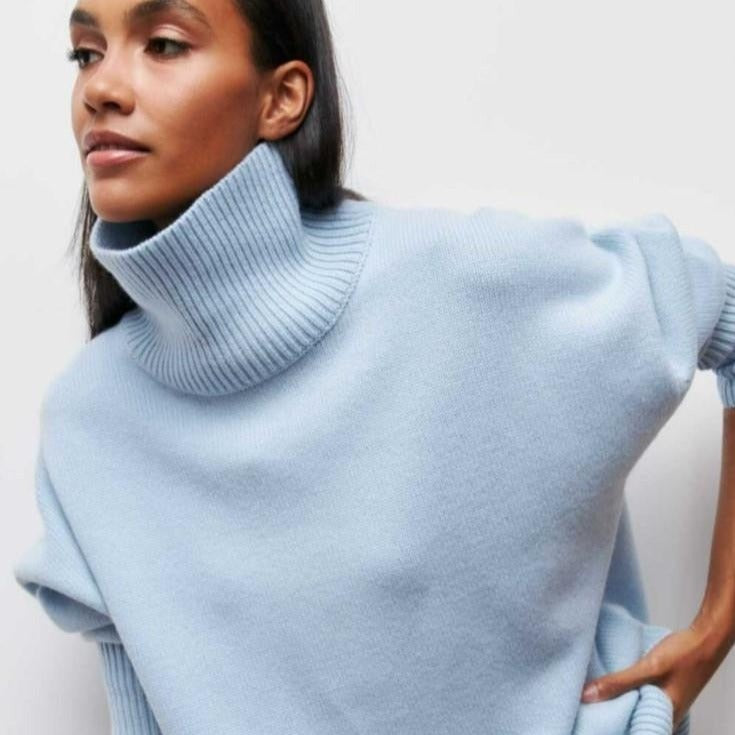 Livia – Różowy sweter oversize z golfem