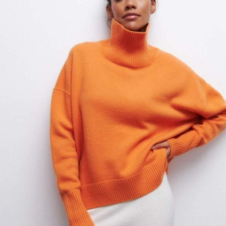 Livia – Różowy sweter oversize z golfem