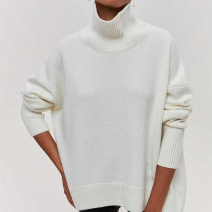Livia – Różowy sweter oversize z golfem
