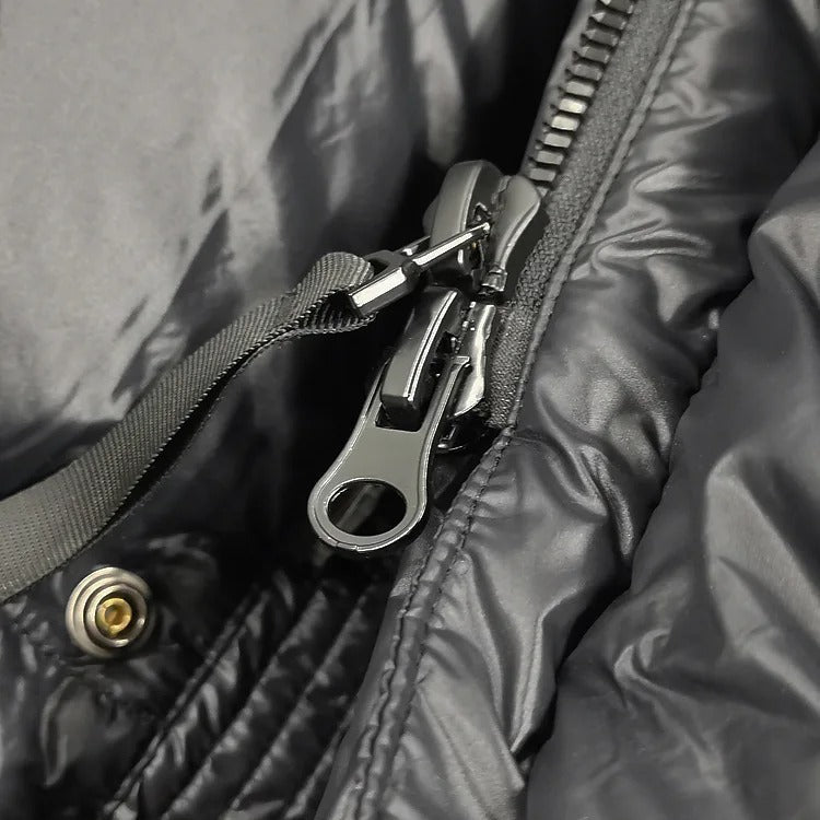 Karolina – Długa pikowana kurtka puchowa z kapturem damska