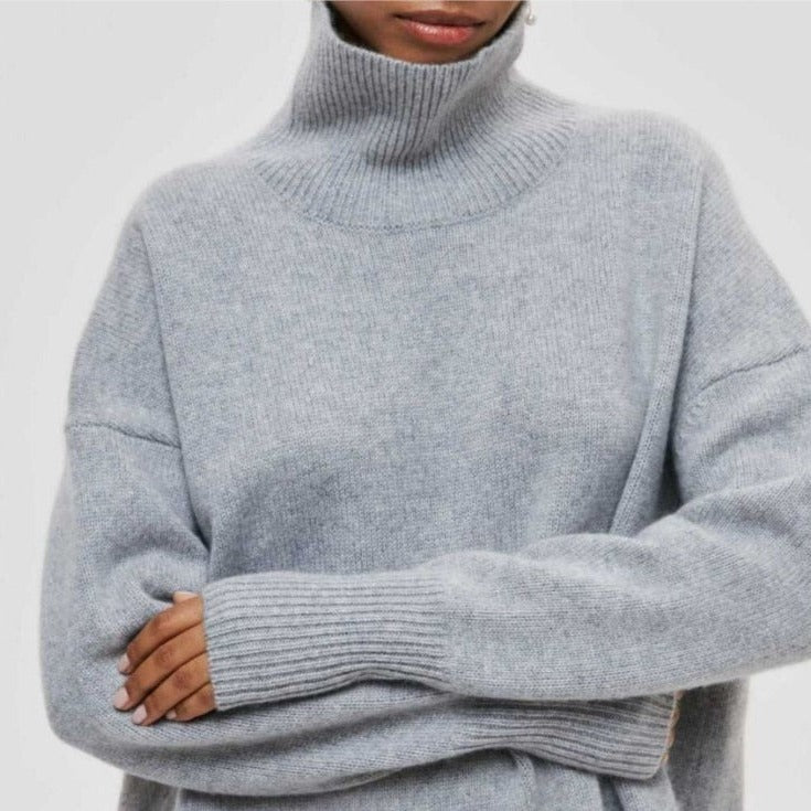 Livia – Różowy sweter oversize z golfem